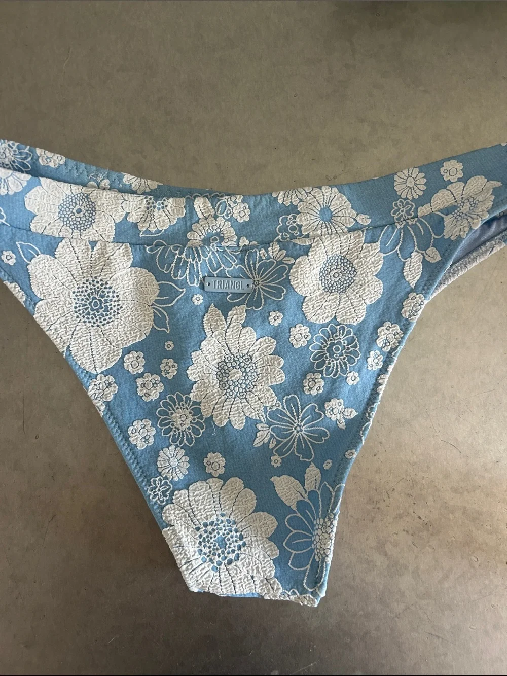 Triangl swimwear, blue white floral bottom size small